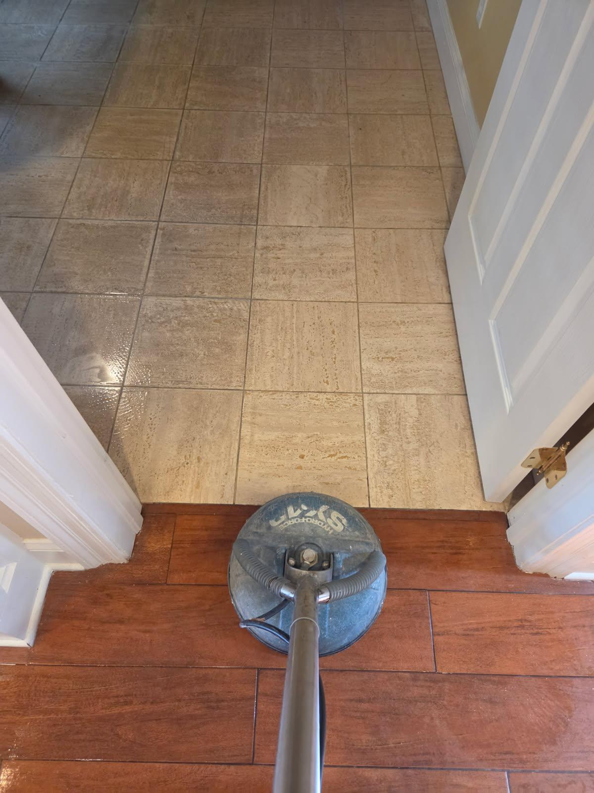 close-up of a scrubber cleaning the tiles of a house