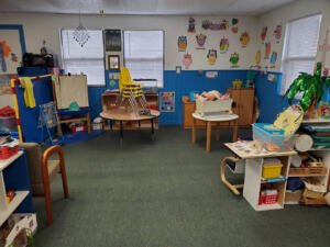 A nursery room with a clean carpet