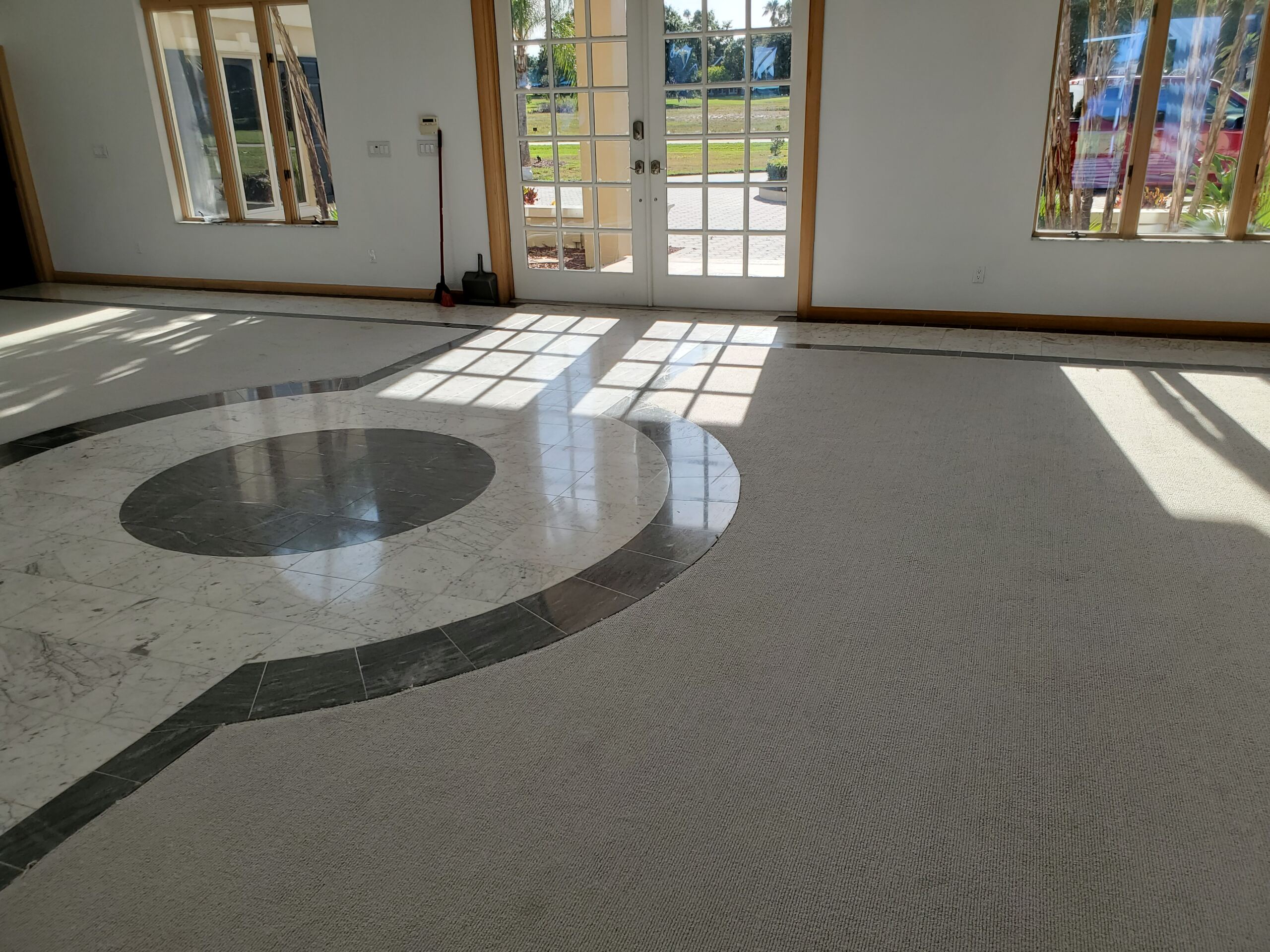 A carpet and tile floor after cleaning