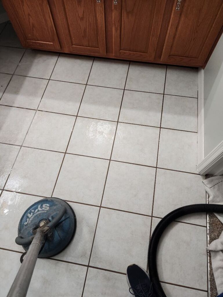 Tile cleaners on the job