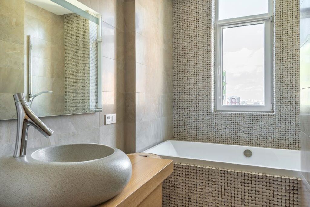 historic mosaic tile floor in a St. Pete bathroom