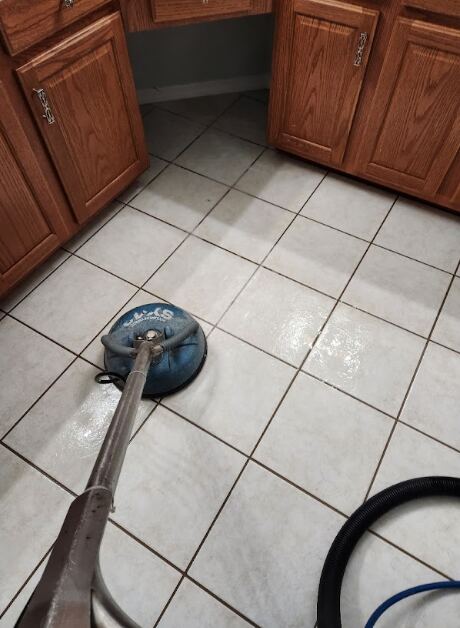 Professional tile cleaners at work.