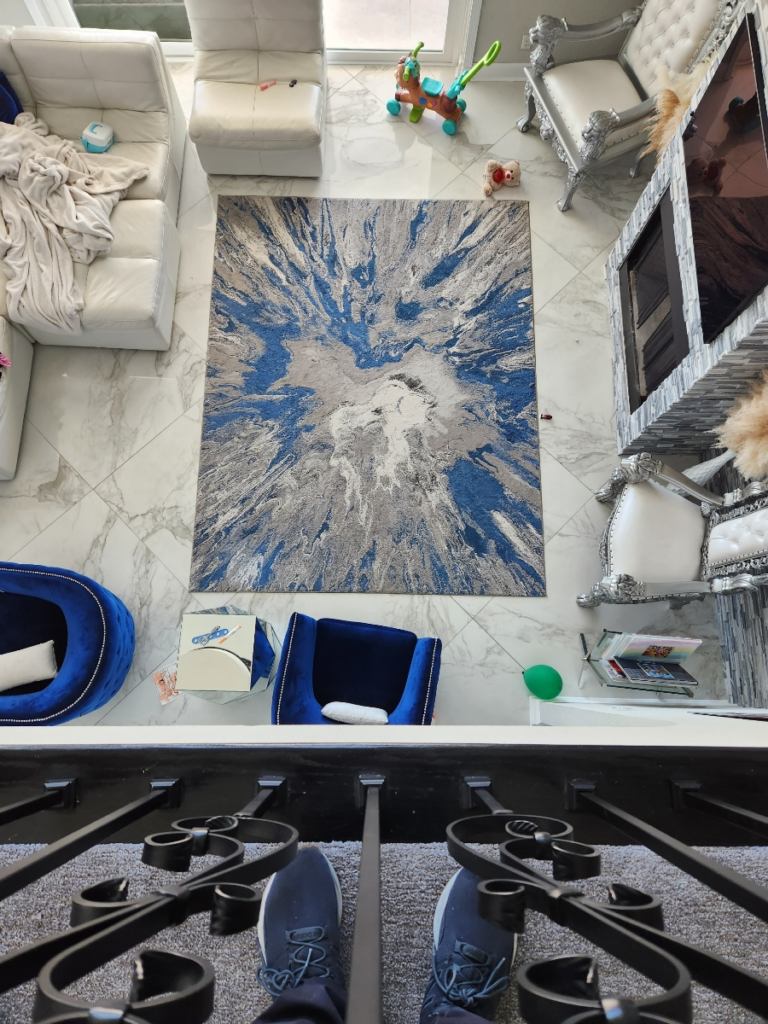 top-view of a blue and grey rug