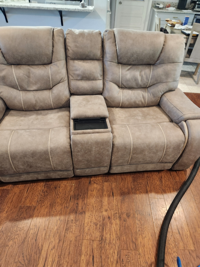 two lounge sofas placed side by side, ready to be cleaned with a pressure vacuum