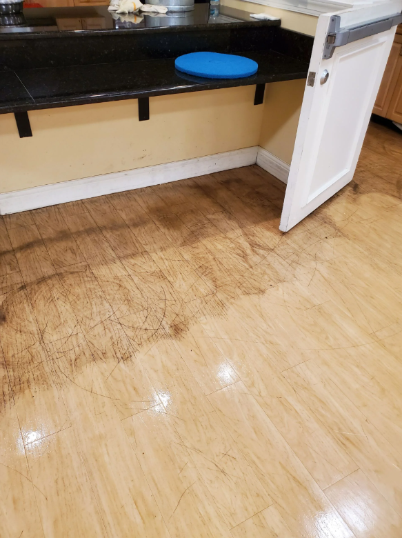 dull luxury vinyl floor with heavy dirt buildup
