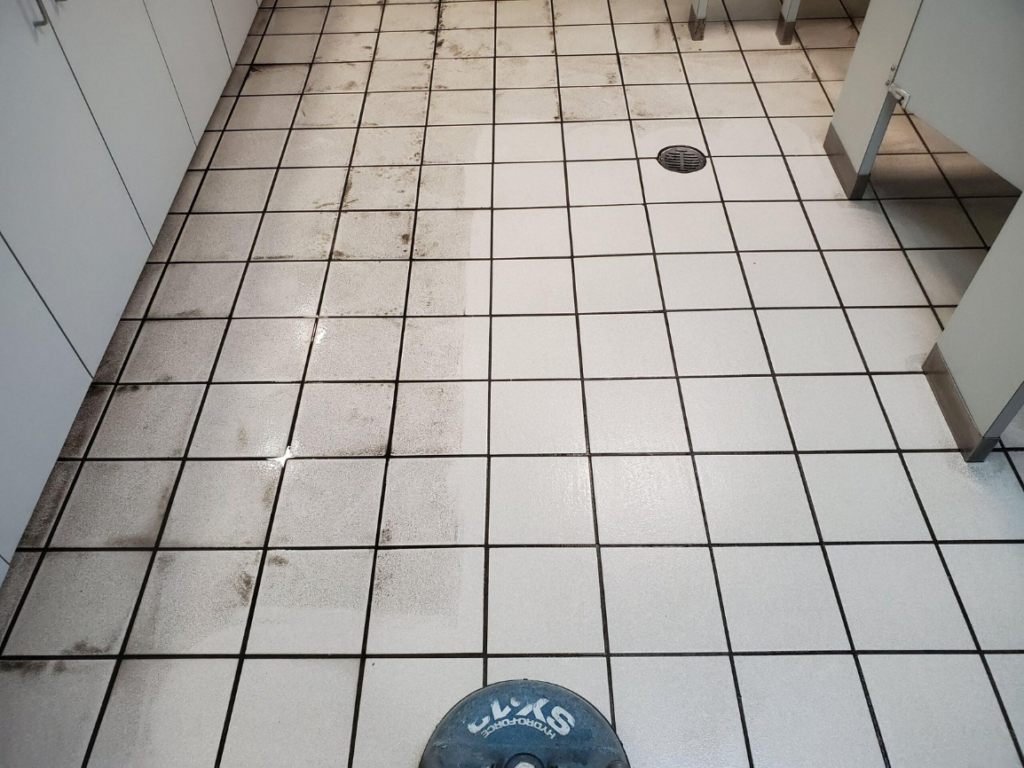 tile and grout cleaning for a commercial restroom