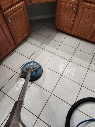 Deep tile and grout cleaning in process. 