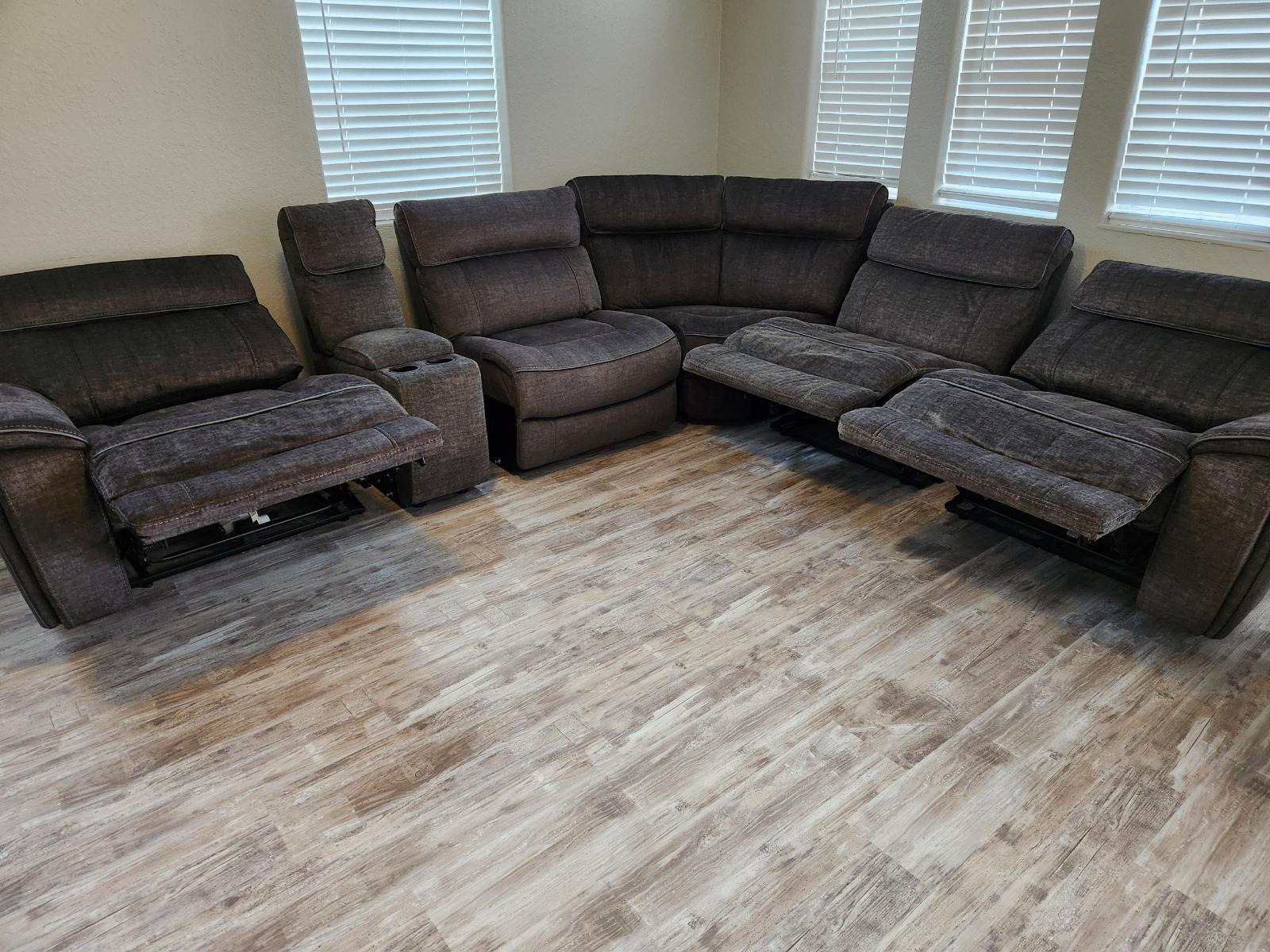 An image of sofas being cleaned