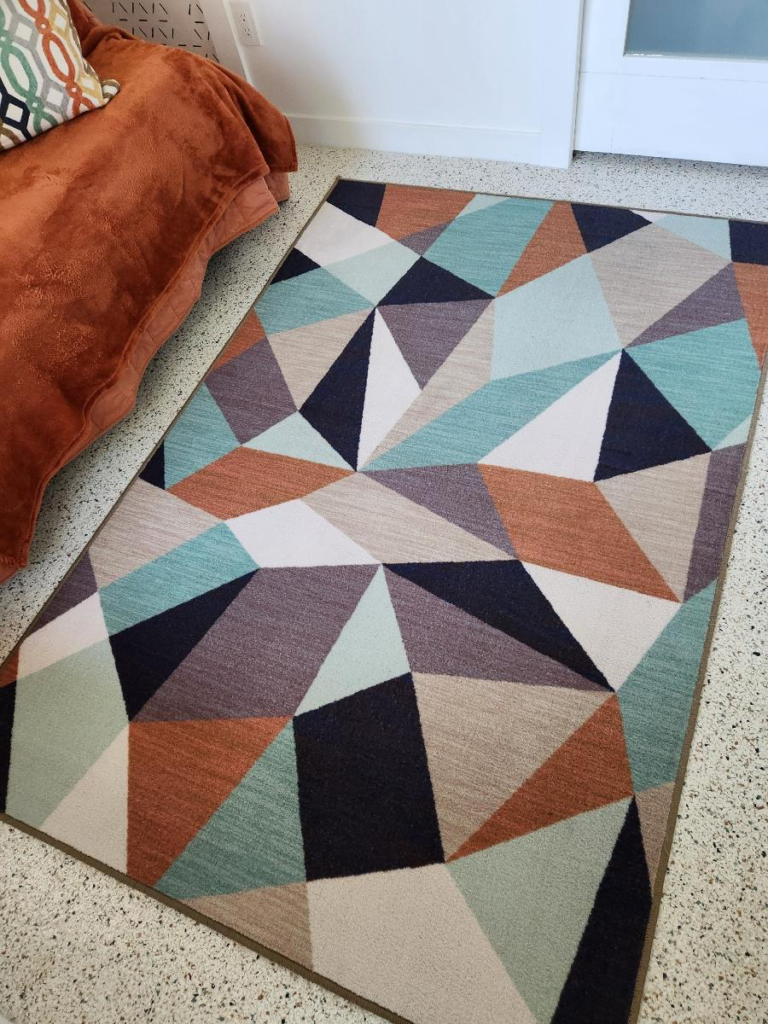 An image of a freshly cleaned rug with bright colors