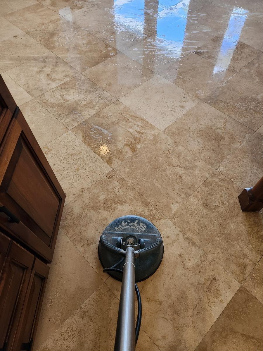 a room with wet tiles during a cleaning session