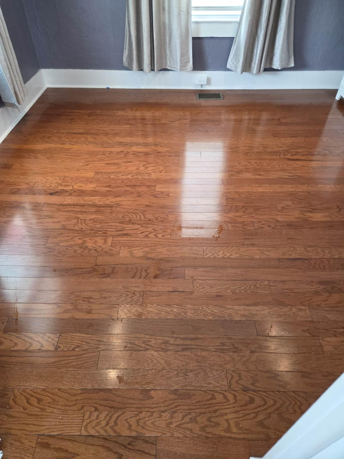 An image of a shiny, clean wooden floor